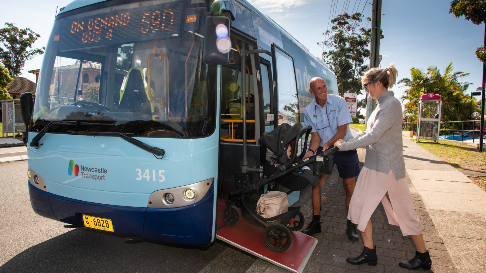 family entering bus