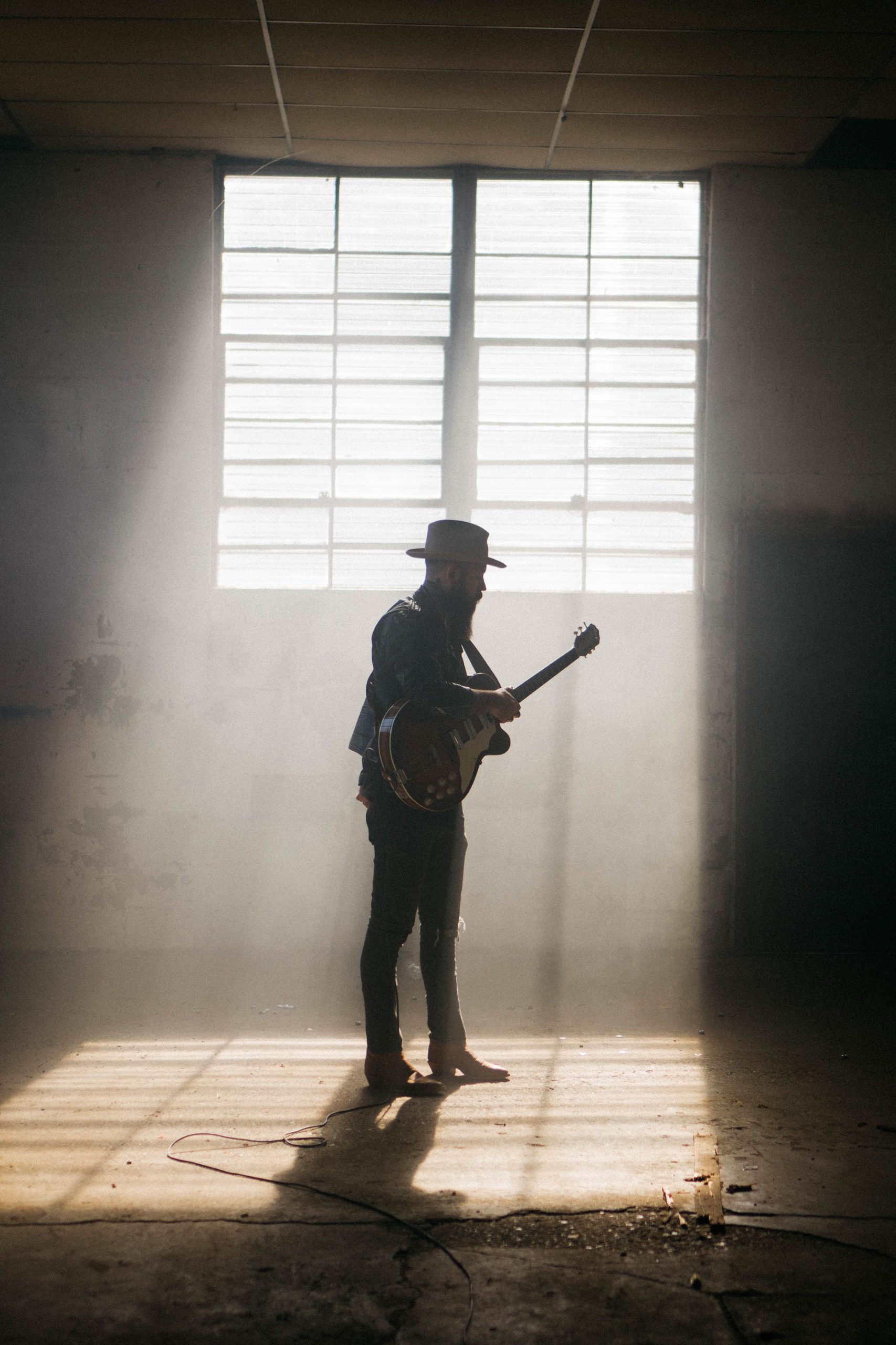 A man playing guitar