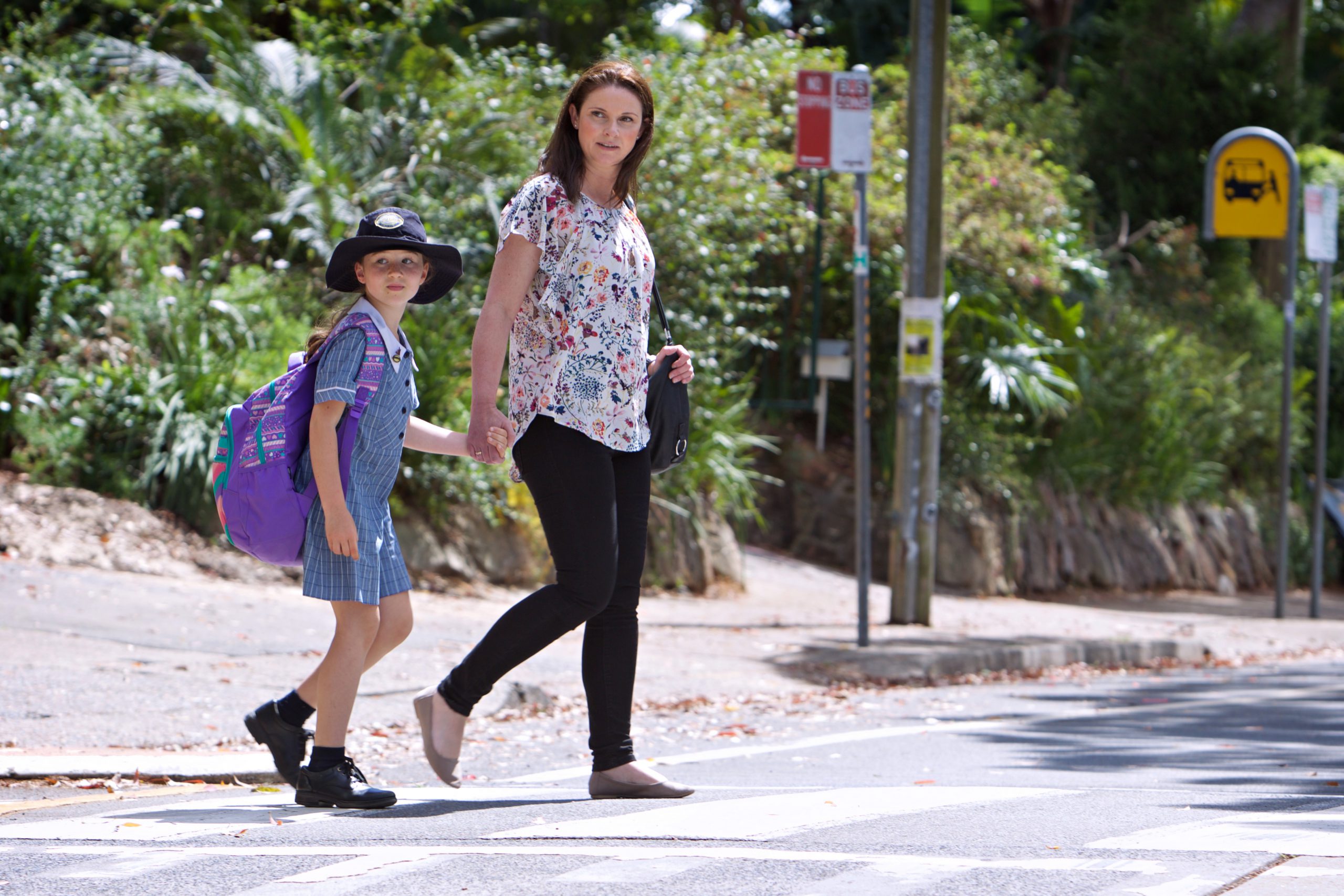 Mother and Daughter Crossing a Road